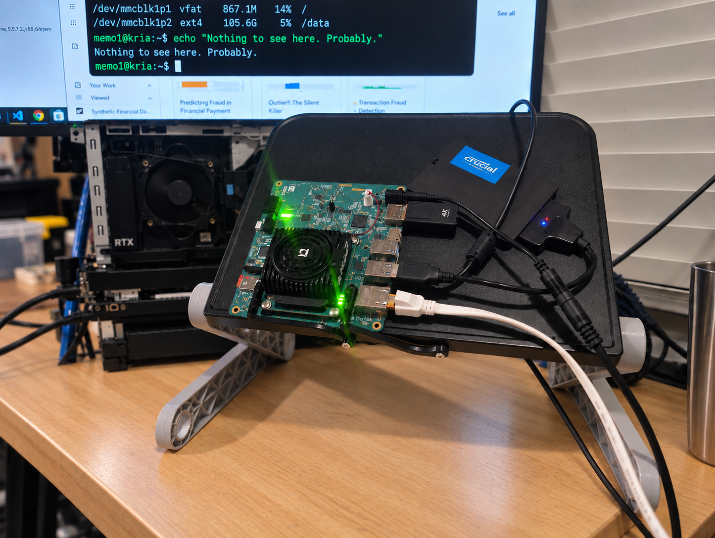 AMD Kria KV260 board on the bench, terminal showing disk usage and a shell prompt